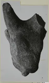 Terracotta fragment, Minor Plastic 1, a worn object with a broken edge, photographed on a card mount
