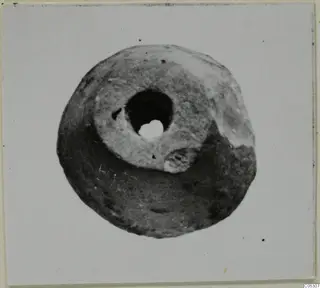 Disc-shaped object with a large central hole, from Lapithos Tomb 403