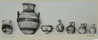 Row of pottery vessels from Stylli, Tomb 9, photographed side by side against a pale background