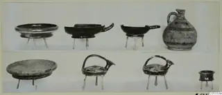 Pottery from Tomb 27 at Marion: shallow bowls on thin stands and a jug, shown in two rows