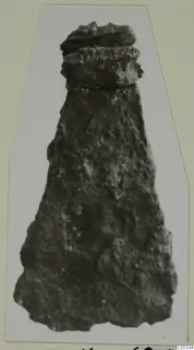 Corroded iron tool from Marion Tomb 36, photographed on a mounted card.