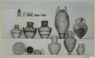 Many pottery vessels arranged on white shelves in three tiers, several with painted bands and patterns.