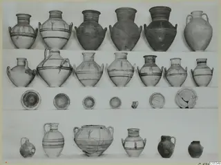 Pottery from Marion, Tomb 95: rows of jars, bowls and juglets photographed on a light ground.