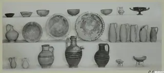Pottery vessels from Marion, Tomb 92, arranged on three shelves