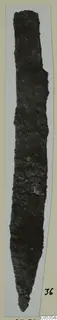 Corroded iron knife blade from Marion, Tomb 39, photographed upright on a mounted card.