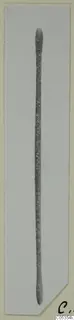 Bronze toilet-requisite from Marion: a long, slender grey rod with rounded ends, shown on a card mount