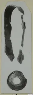 Bronze toilet-requisites from Marion: several corroded metal fragments, including a curved strip and a ring.