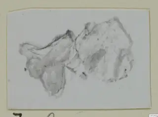 Faint, washed-out photograph of an irregular fragment from Amathus, mounted on a beige card