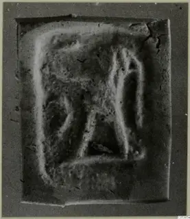Rectangular glyptic piece from Amathus with a raised design on its face