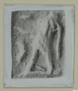 Glyptic find from Amathus, blurred photograph mounted on a white card.