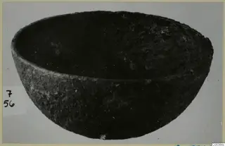 Bowl from Amathus, shown in side view against a grey background