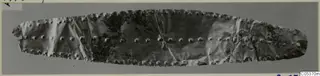 Gold jewellery strip from Amathus, a long narrow sheet with rows of raised studs along its edges and centre
