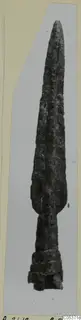 Bronze spearhead from Amathus, with a long leaf-shaped blade, a midrib and a socket at the base, corroded surface.