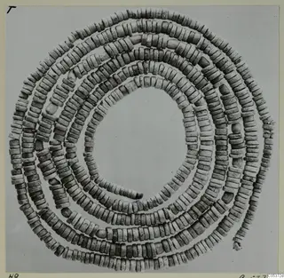 Necklace of small disc-shaped beads coiled in a spiral, from Amathus