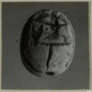 Scarab from Amathus, tombs 2–26, close blurred view of its carved surface