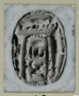Oval seal or scarab with an incised design, photographed on a mounted card, from Amathus