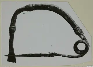 Bronze pin with a bow, knobs and spiral coil, from Amathus tomb 2-26