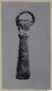 Bronze toilet requisite with a loop at one end, from Amathus