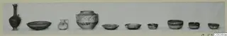 Row of ten pottery vessels from Amathus Tomb 7, including juglets, a large painted jar and small shallow bowls