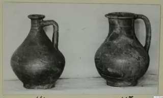 Two single-handled jugs from Amathus finds, photographed side by side