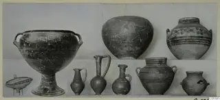 Pottery vessels from Amathus Tomb 12, photographed in two rows against a pale backdrop