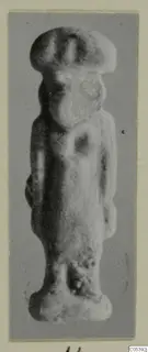 Standing figurine of Sekhmet from Amathus, shown against a grey backdrop.