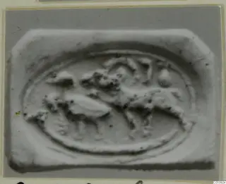 Glyptic scarab from Amathus, showing a raised oval scene with an animal and figures