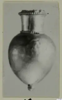 Teardrop-shaped vessel with a tall flared neck and ridged rim, from Marion, Tomb 56