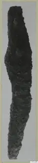 Heavily corroded iron tool from Amathus, long and tapering, with a bulge near the upper part.