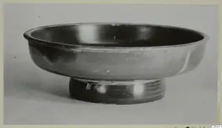 Black glazed bowl with a low ring foot, from the Marion tomb finds
