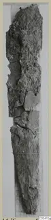 Corroded iron sword from Amathus tombs 1–9, shown as a long, encrusted fragment on a pale backing.