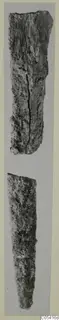 Two corroded iron weapon fragments from Amathus, photographed one above the other on a pale grey ground