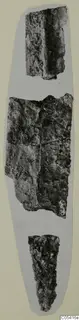 Three corroded iron weapon fragments laid in a line on a grey card, from Amathus.