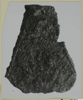 Corroded iron object from Amathus, a tapering fragment with a rough, crusted surface