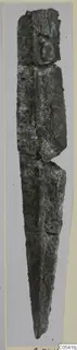 Corroded iron weapon from Amathus, shown upright against a grey background
