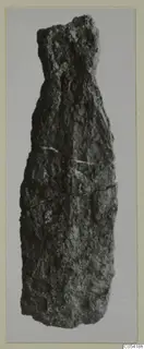 Corroded iron weapon fragment from Amathus, long and narrow with a narrower broken top end.