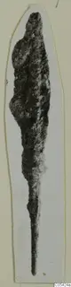 Corroded iron weapon with a broad upper blade tapering to a long, thin tang