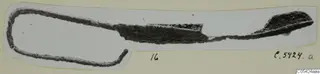 Strigil from Marion Tomb 52, a curved dark metal implement with a looped end, mounted on a card