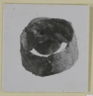 Bronze ring from Marion, Tomb 69, shown on a photograph card mount