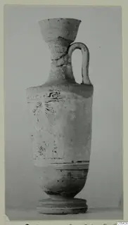 Lekythos in White Grounded Ware from Marion, tombs 31–45 series, shown against a plain grey backdrop