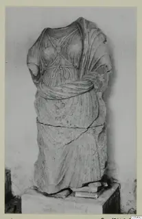 Draped stone statue from Arsos, headless with broken arms