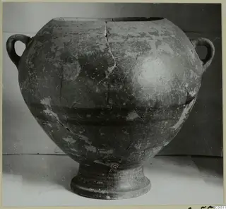 Two-handled pottery jar from Amathus with a dark painted band around the body