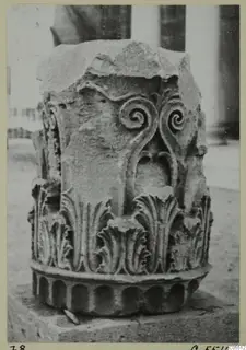 Carved stone capital fragment from Amathus, with spiral scrolls above rows of carved leaves
