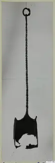 Bronze shovel with a ring at the top, a long twisted shaft and a scoop-shaped blade with a broken section.