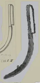 Corroded iron curved tool with a looped top, photographed beside a line drawing of the same object