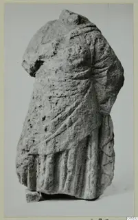 Headless draped statue torso from Mersinaki, carved in stone.