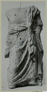 Draped limestone sculpture fragment from Mersinaki, with the head and upper body broken away