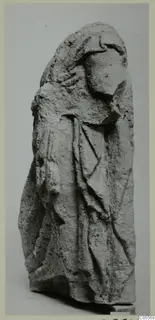 Limestone sculpture of a draped standing figure with a veiled head, from Mersinaki