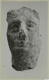 Terracotta fragment of a modelled human face from Mersinaki, shown frontally