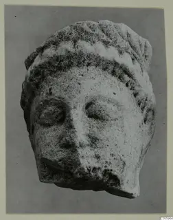 Limestone head fragment from Mersinaki, shown from the front